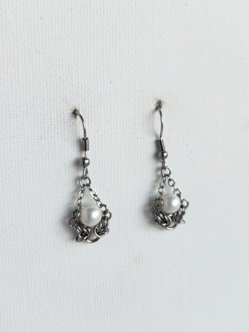 Vintage Victorian style white pearl and silver dangly earrings